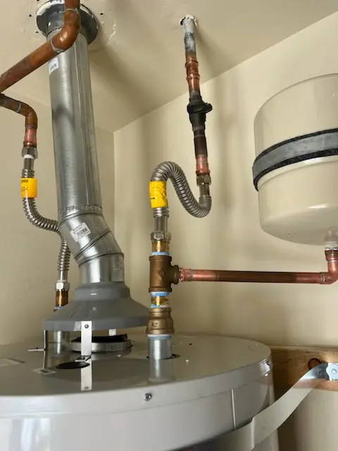 Water heater installation and plumbing repair in Roslindale